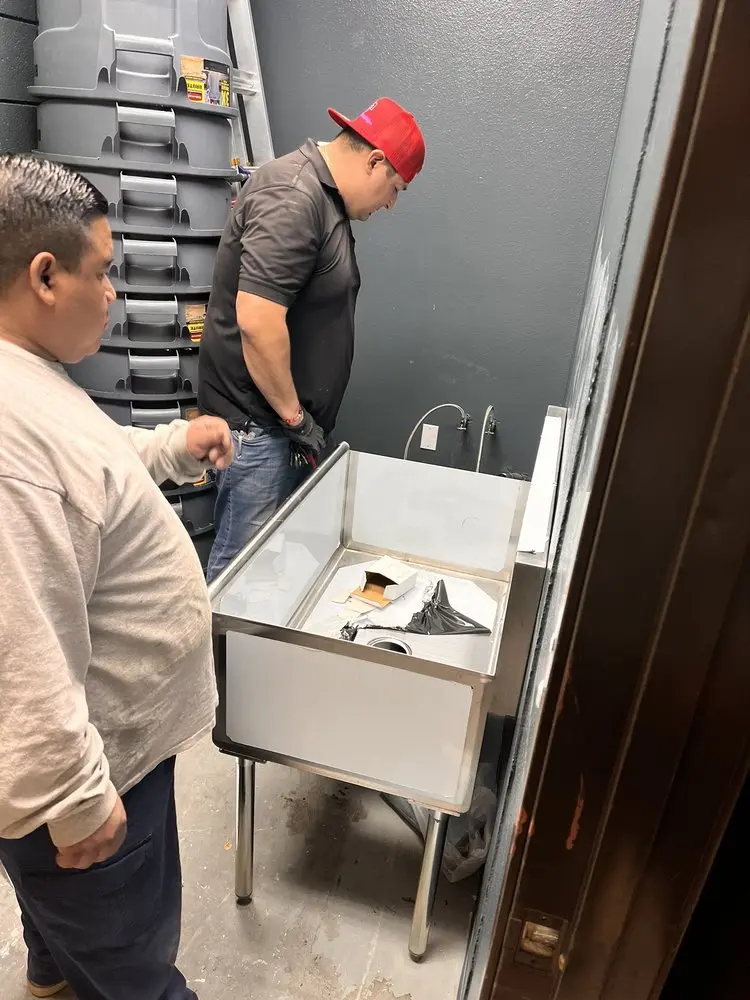Commercial plumbing and sink installation in Surfside